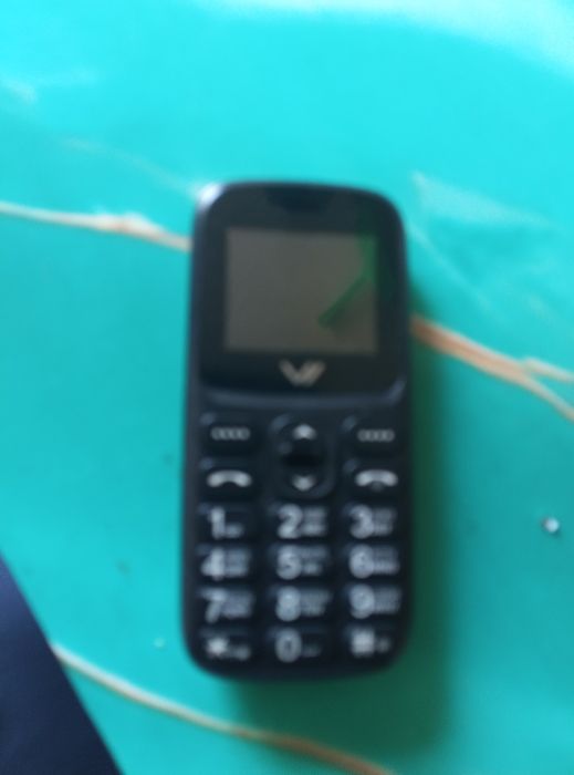 Продам телефон vertex.