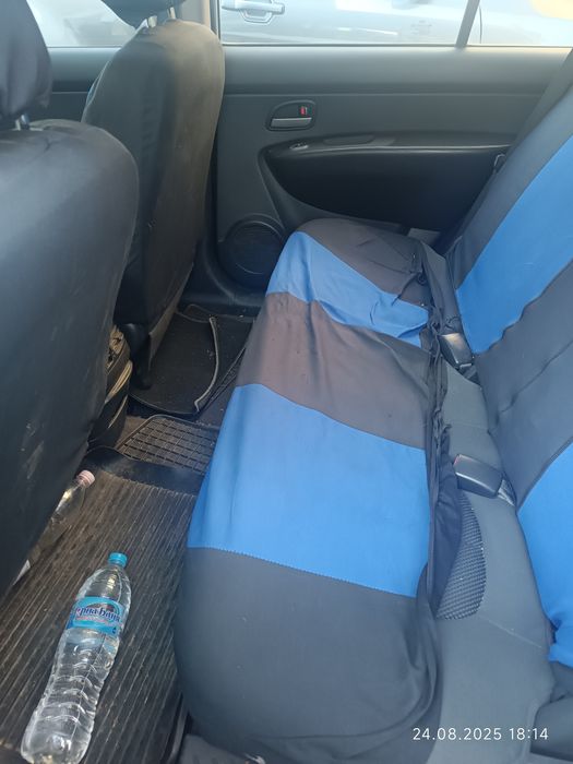 Kia carens  бензин/газ