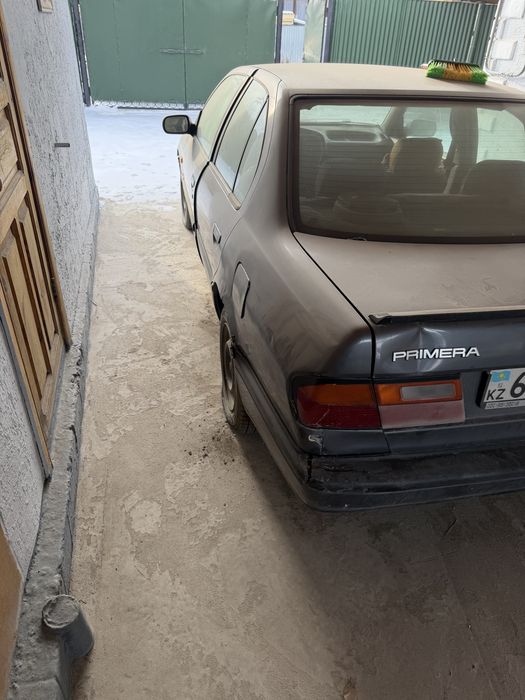 Машина ниссан премьера