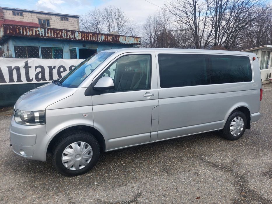 VW Transporter-Caravelle Modelul Lung 2011 8+1 Locuri