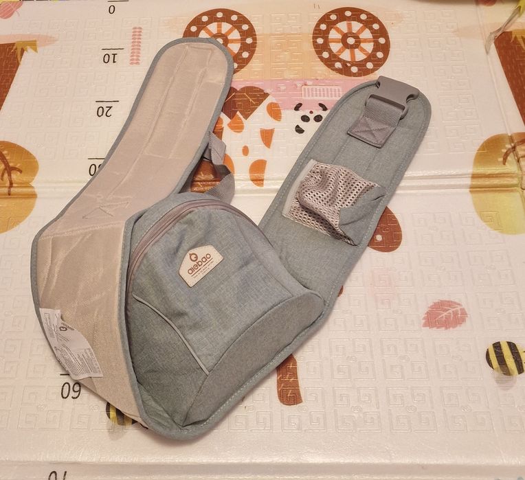 ЧИСТО НОВ Ергономичен хип ситър (седалка за носене на бебе)