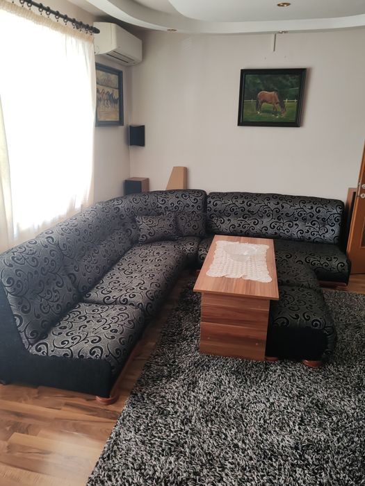 Ъглов диван за хол, фотьойл и две табуретки.