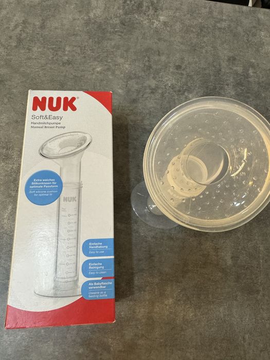 Ручной молокоотсос фирмы Нук