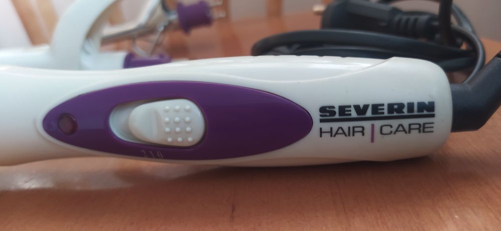 Плойка с тремя насадками.