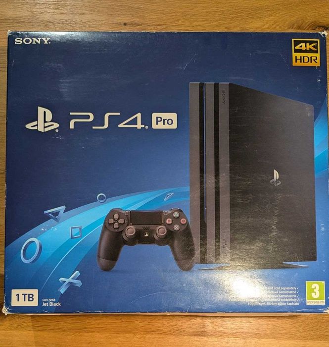 Playstation 4 Pro 1 TB + 3 gamepads + gamepad charger + God of War