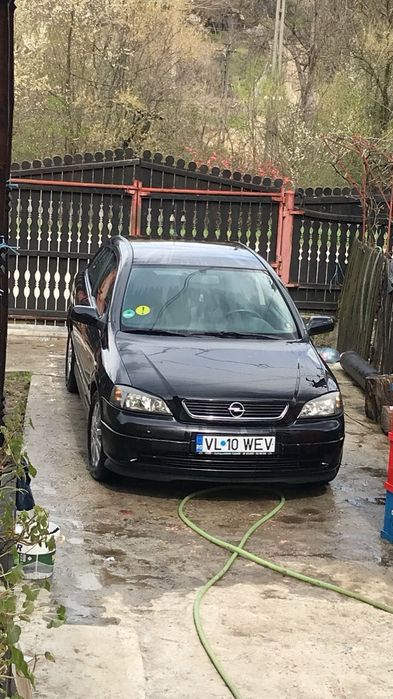 vând/schimb cu remorca auto   Opel Astra G