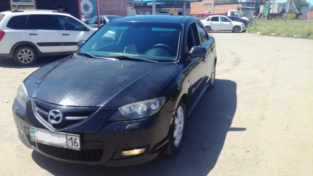 Мазда 3 2008г 2,3