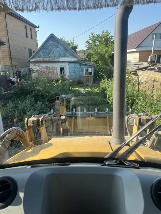 Эскаватор жүк тиеуіш қызыметі
