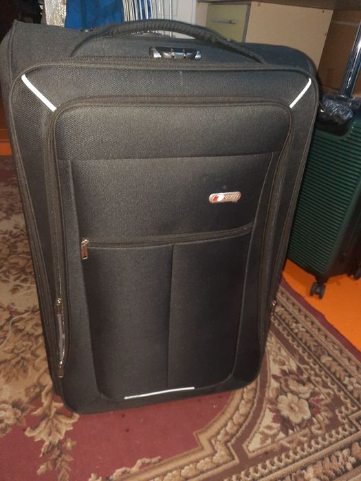 Продам новые Чемоданы