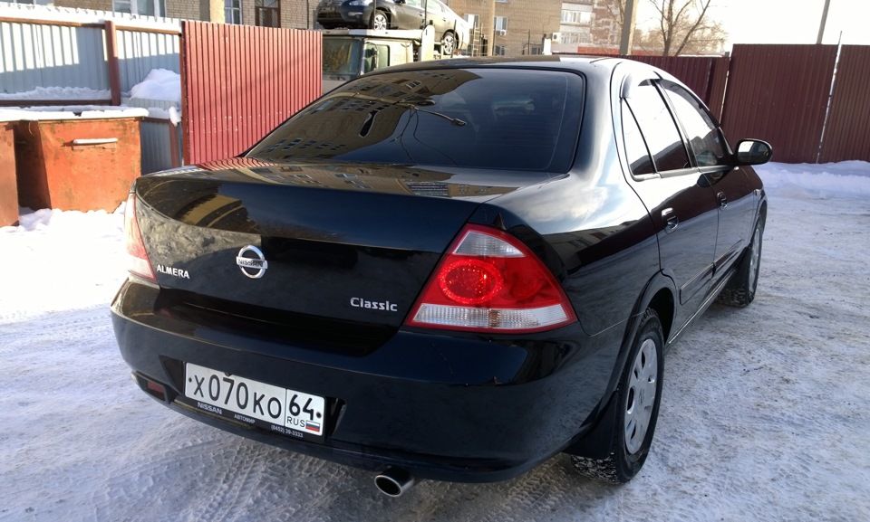 Свет альмера классик. Ниссан Альмера Классик 2007 сзади. Nissan Almera Classic 2011 со спойлером.