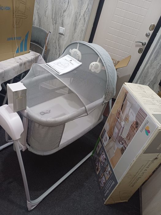 Продаётся электронная люлька кровать манеж 4в1 новый