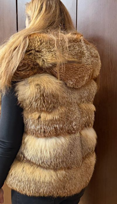 Vesta blana vulpe