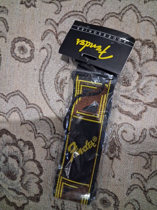 Продам каподастр струны ремень