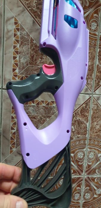 Toy  gun darts in stare perfect