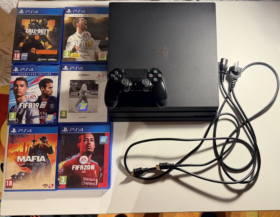 PlayStation 4 Pro 1TB + джойстик + 6 игри (FIFA, Call of Duty, Mafia)