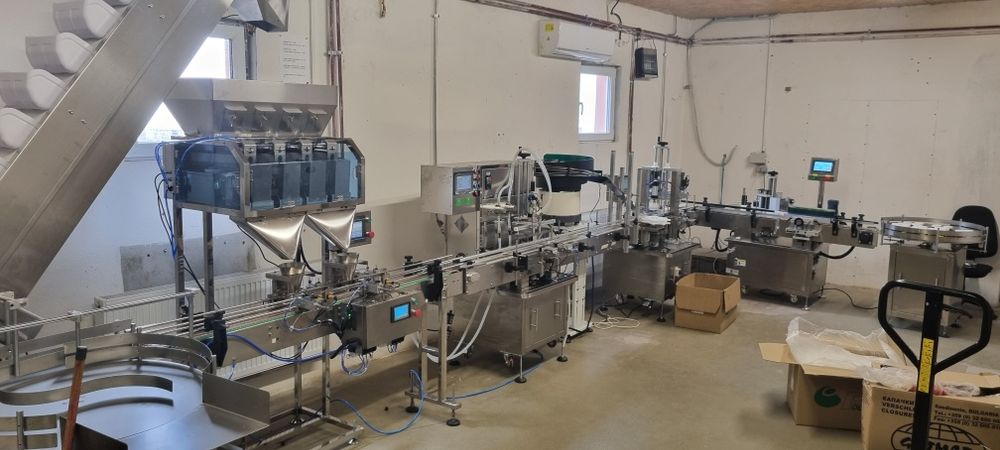 Linie de imbuteliat apă, creme, granulate, produse mixte