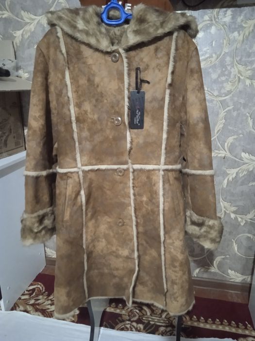 Женский пальто новый