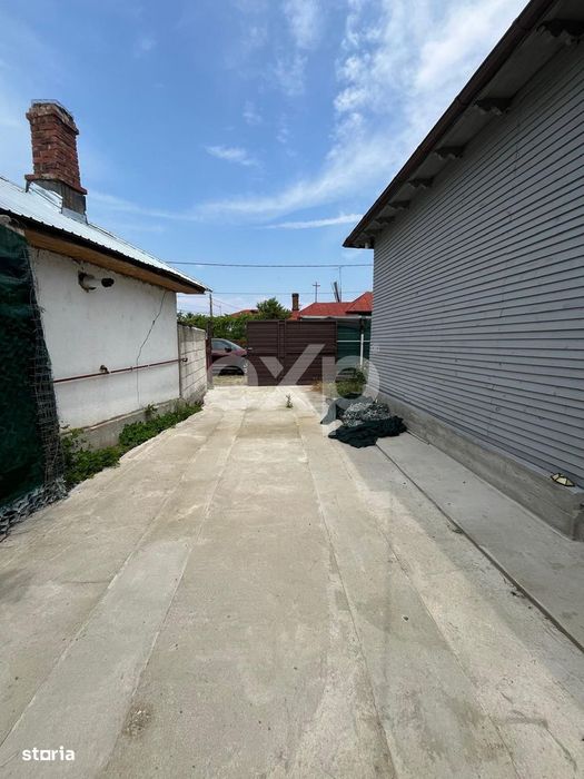 Locuinta moderna cu doua intrari separate, izolatie premium, zona verd