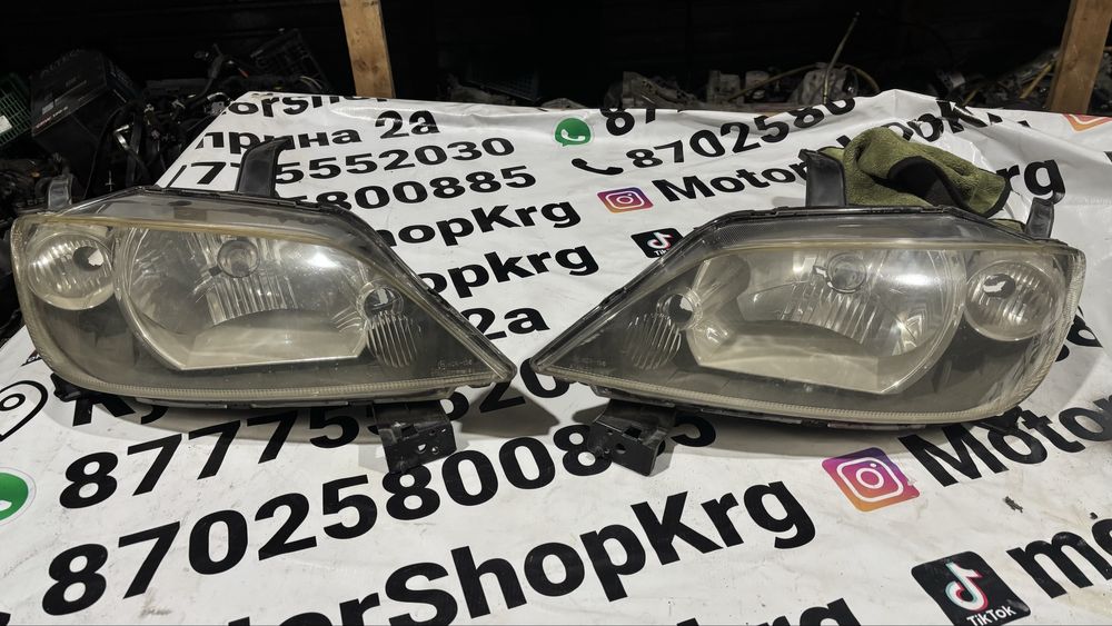 Фары мазда демио mazda demio