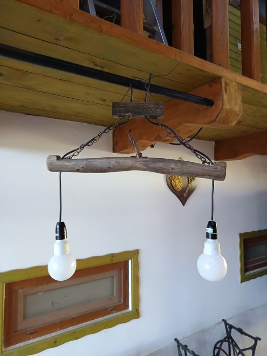 Lustra , lampa artizanala din cruce de caruta