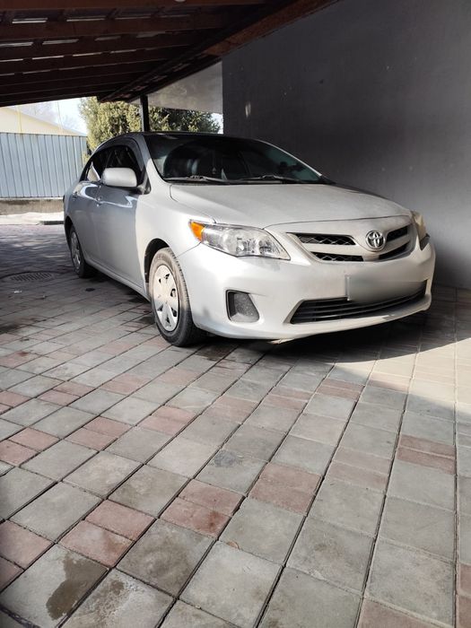 Машина Тайота каролла