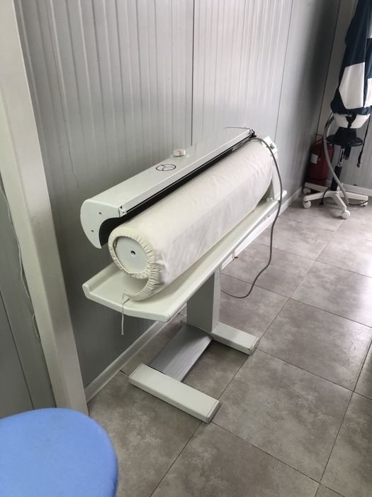 Каландър за гладене на чаршафи и покривки.