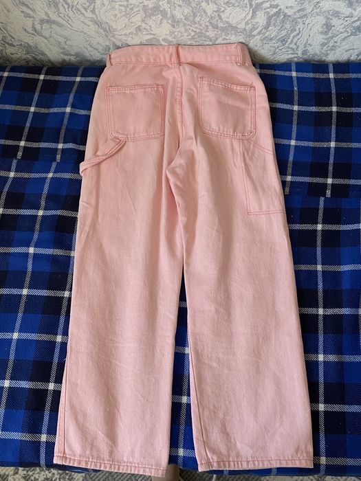 Джинсы розовые