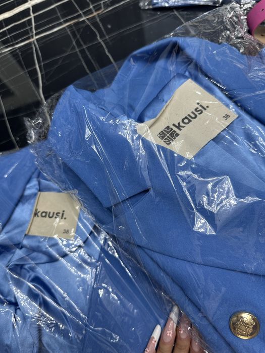 Женский костюм .