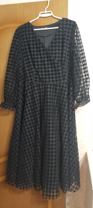 Женская одежда платья