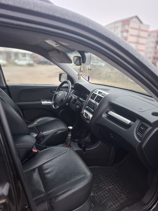 Vând kia sportage