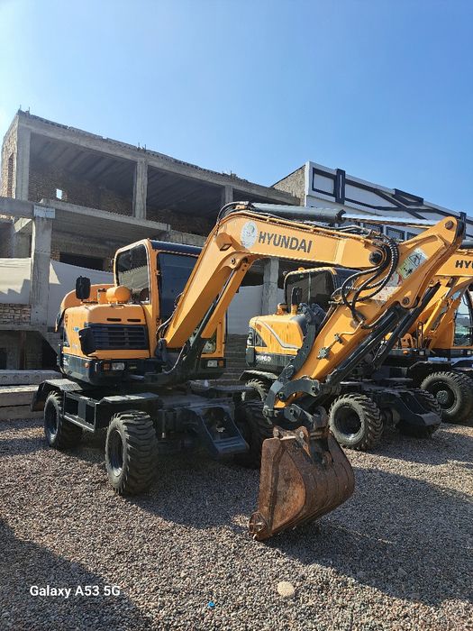 Экскаватор  хизмати