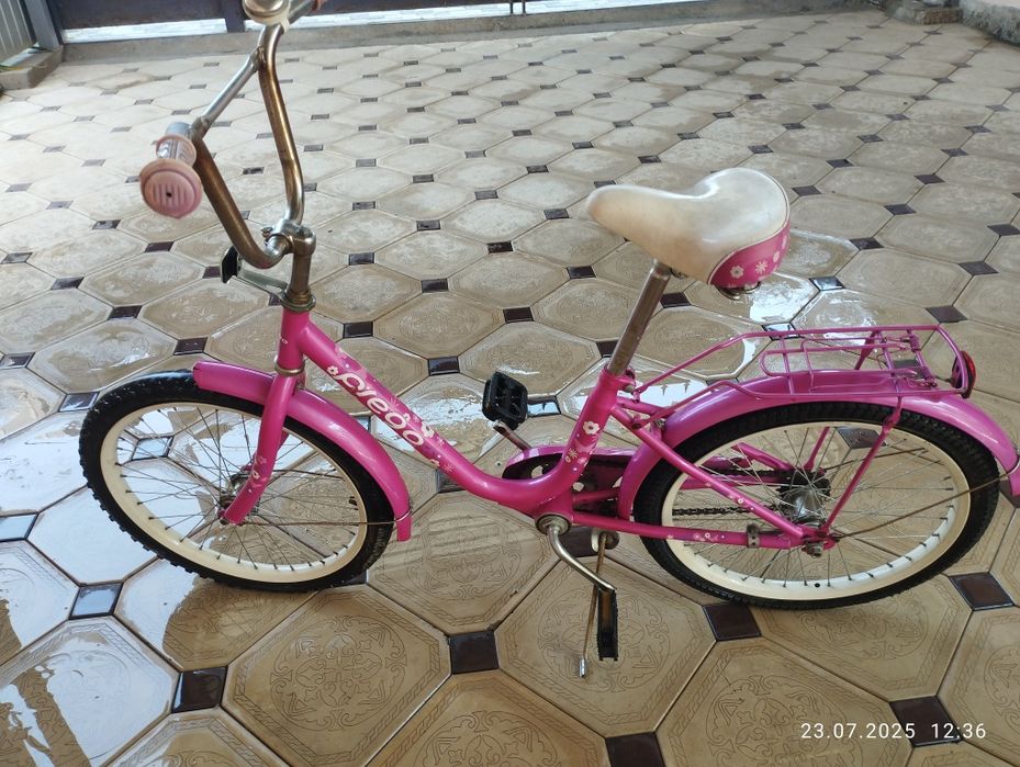 Велосипед розовый