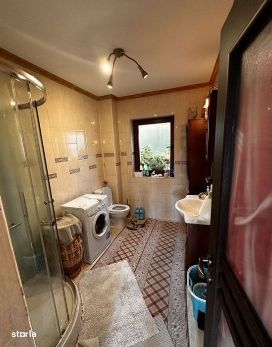 Apartament cu gradina in bloc tip vila, 75 mp util + 120 mp, parcare