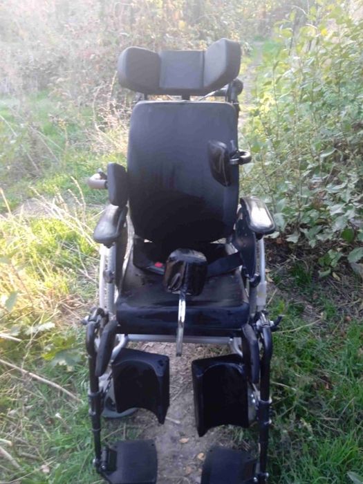 Инвалидная коляска.
