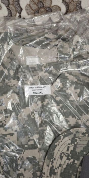 Камуфлажни дрехи