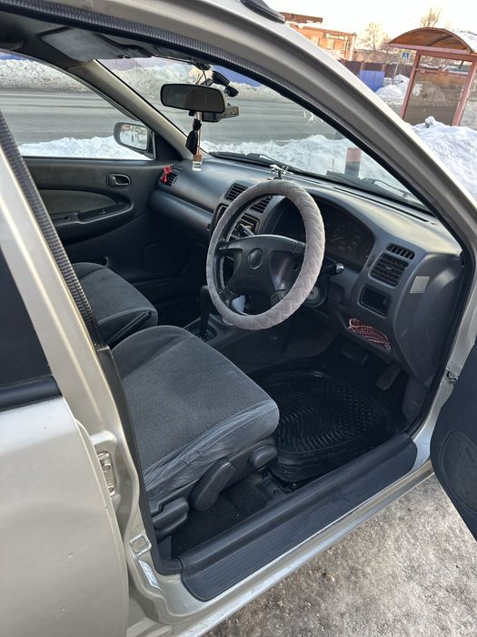 Продам машину mazda familia