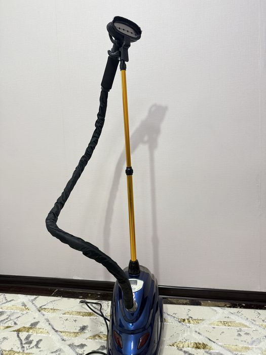 паровой утюг.