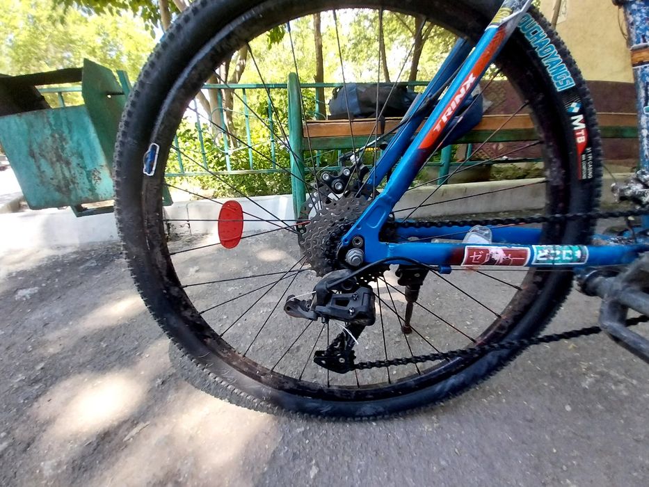 Велосипед сине-красный trinx