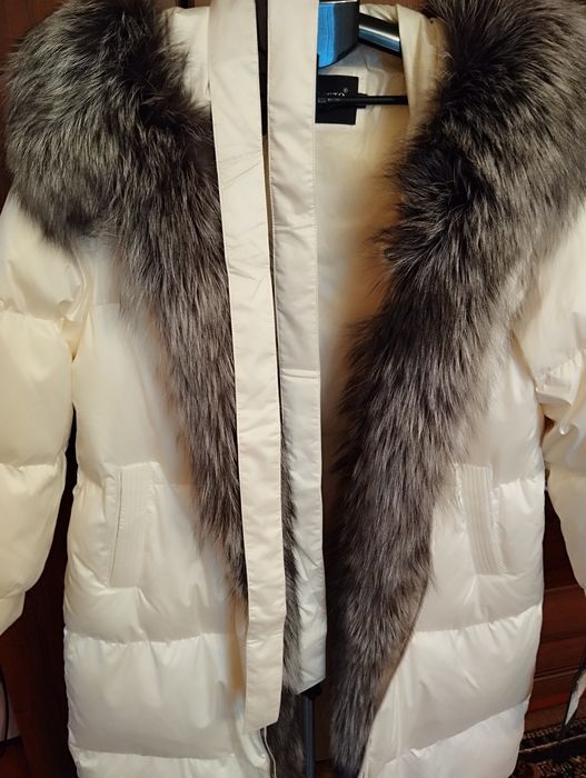 Продам пуховик женский.