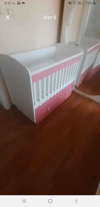 Детска кошара с люлеещ механизъм