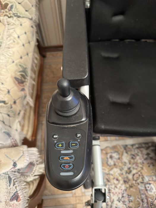 Электрическая  инвалидная коляска