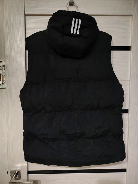 Продам жилетку новая