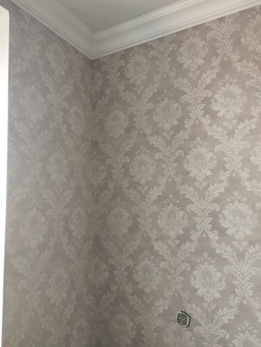 Поклейка  обоев.