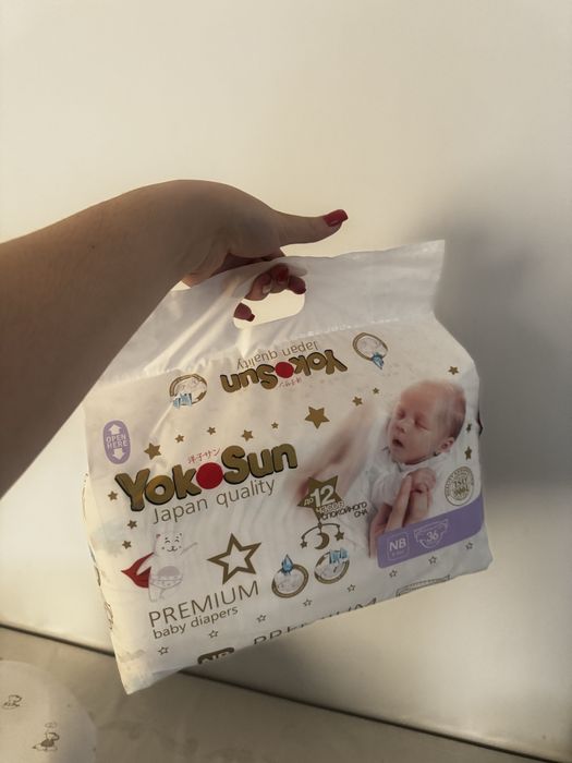 продам 2 пачки новых памперсов