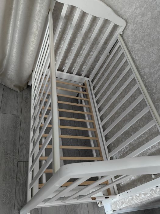 Детская кроватка маятник