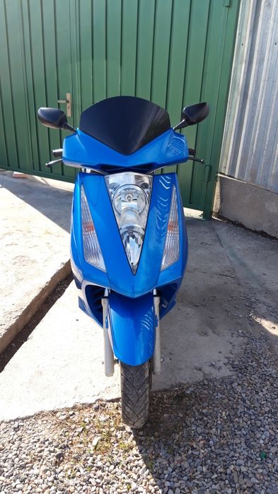 Скутер Honda pantheon