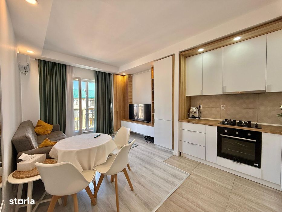 COSMOPOLIS - Apartament cu 2 camere tip studio, mobilat si utilat.
