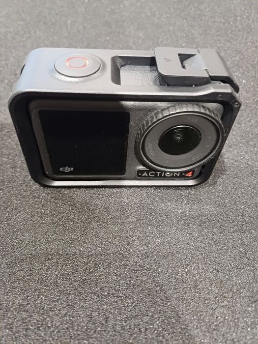 Camera DJI , Action 4 cu carcasa de protectie  , ca noua