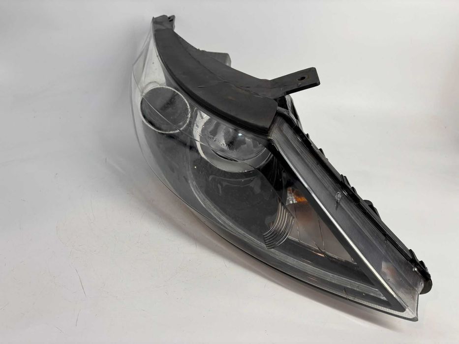 Far cu xenon stanga-dreapta Kia Sportage an 2013