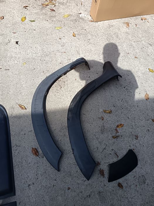 Overfendere aripi față spate bandouri Dacia Duster
